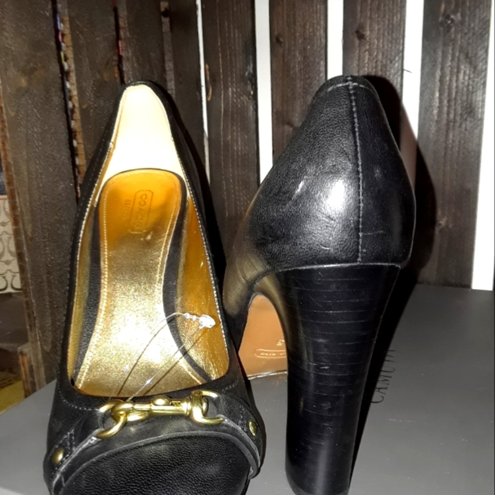 Coach  size 9.5 Black gently worn. 3.5 inch heel. Leather **READ**